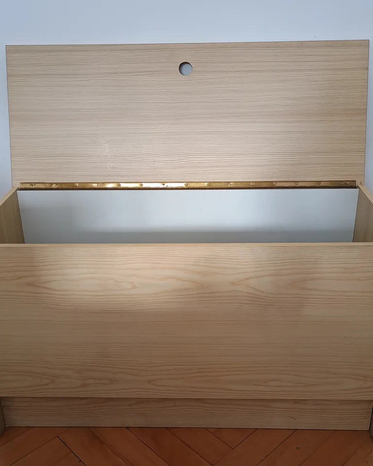 Wooden storage bench with a lift-up seat