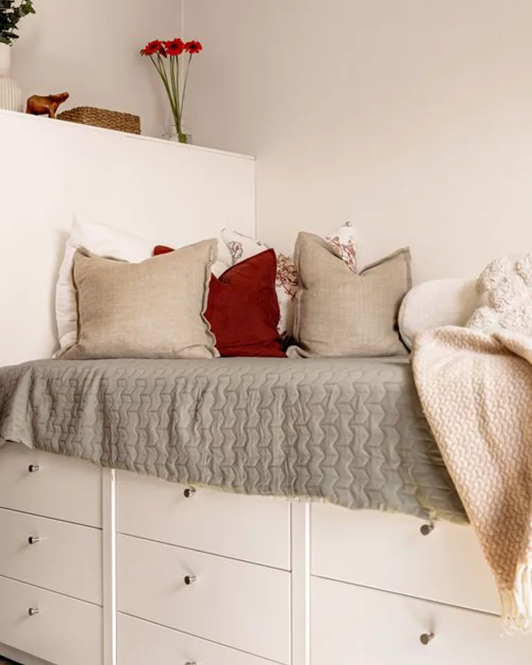 Low drawer storage fitted under a sloped bedroom ceiling