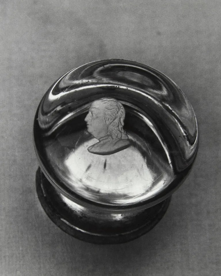 Close-up of a new cabinet door knob and hardware