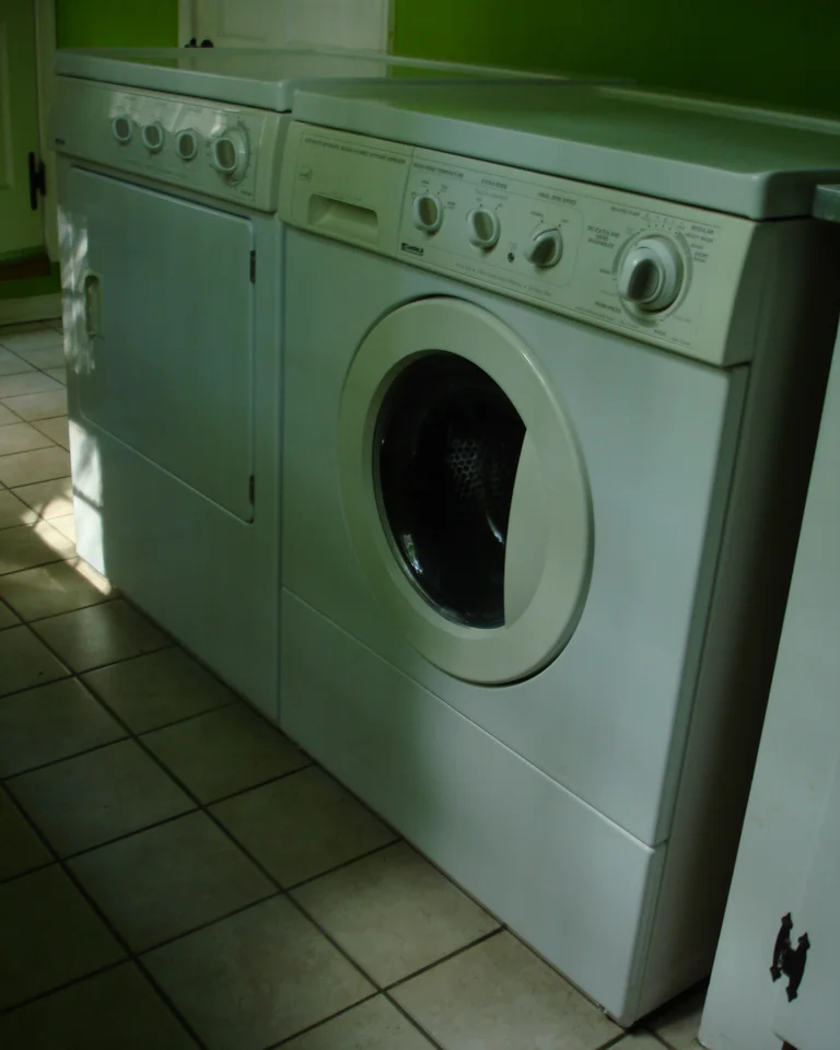 Washer and dryer pair in a home laundry room