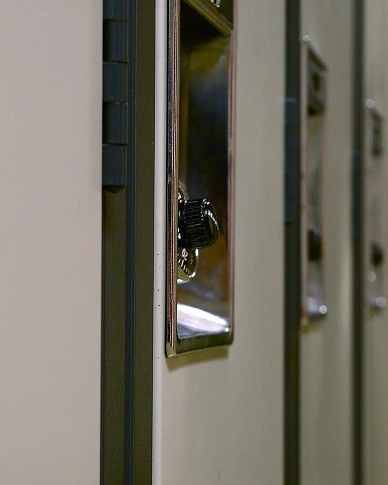 Row of numbered lockers inspiring per-person mudroom storage