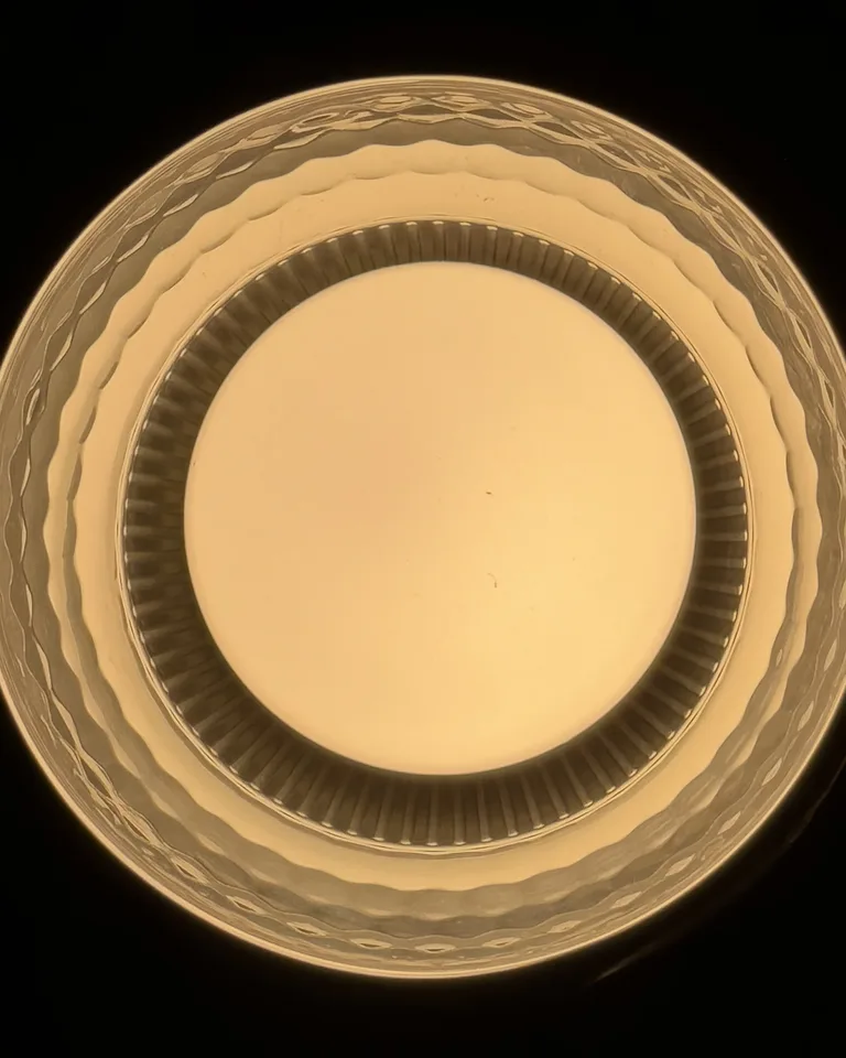 Simple flush-mount ceiling lamp in a hallway