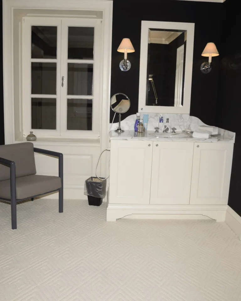 Modern interior with a pair of glowing wall sconces