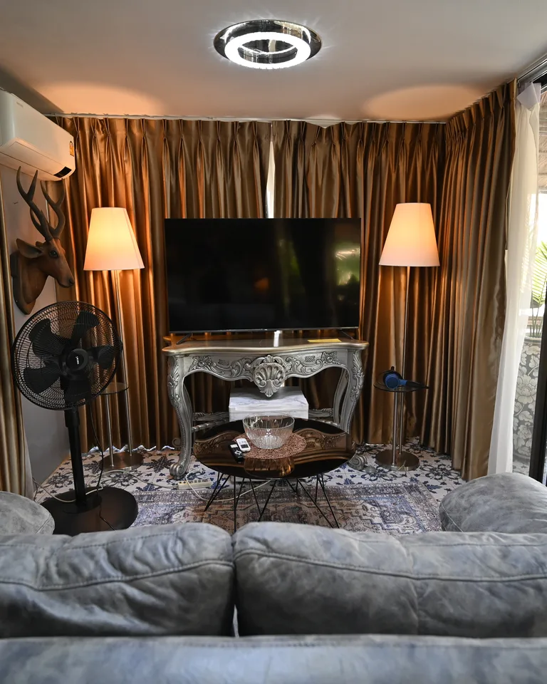 Cozy living room corner with warm floor lamps