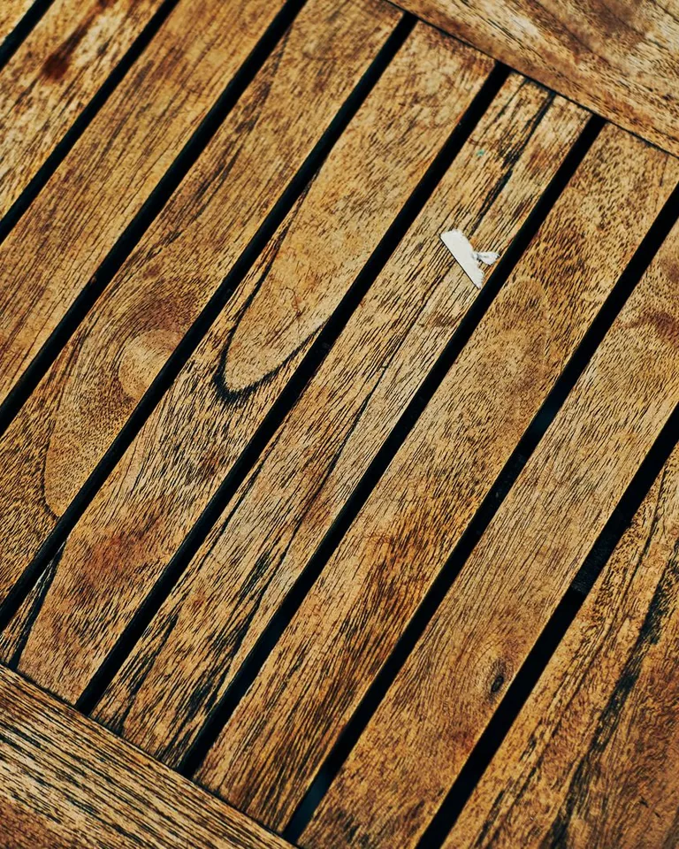 Close-up of rustic wooden grain texture in warm tones