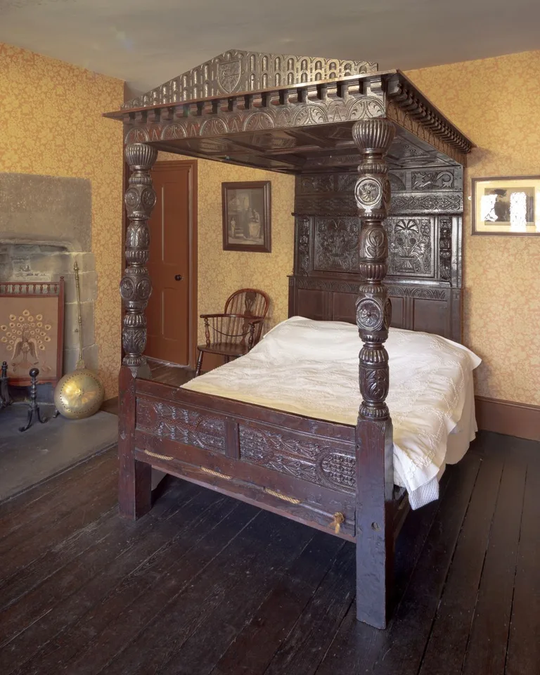 French four-poster canopy bed as the focal point of an elegant bedroom