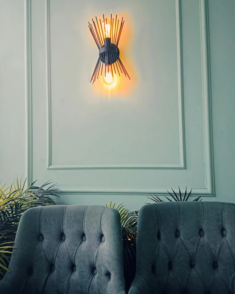 Interior with stylish wall sconce lighting