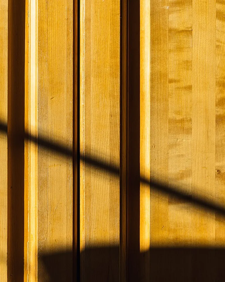 Close-up of vertical natural wood grain texture
