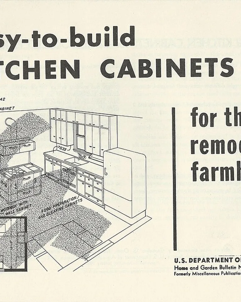 Kitchen with dark lower cabinets and light upper cabinets