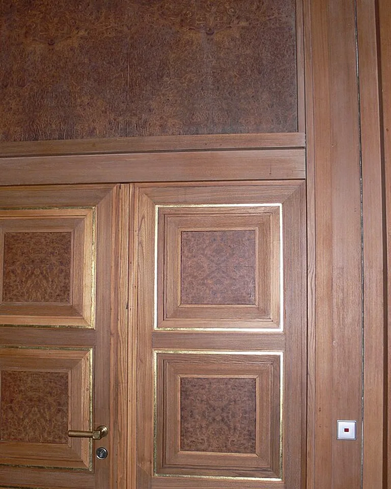 Fluted wood panel detail on the end of kitchen cabinetry