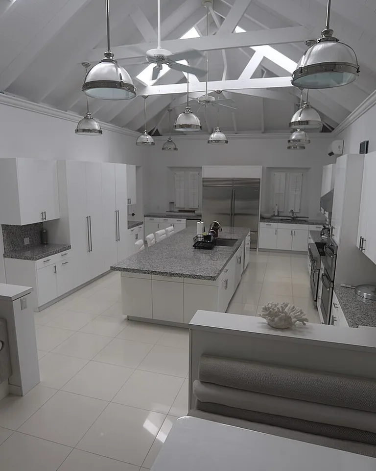 Pendant lights hanging over a kitchen island