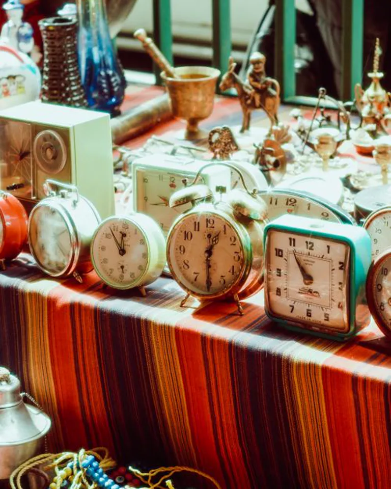 Vintage treasures and antiques at a flea market stall