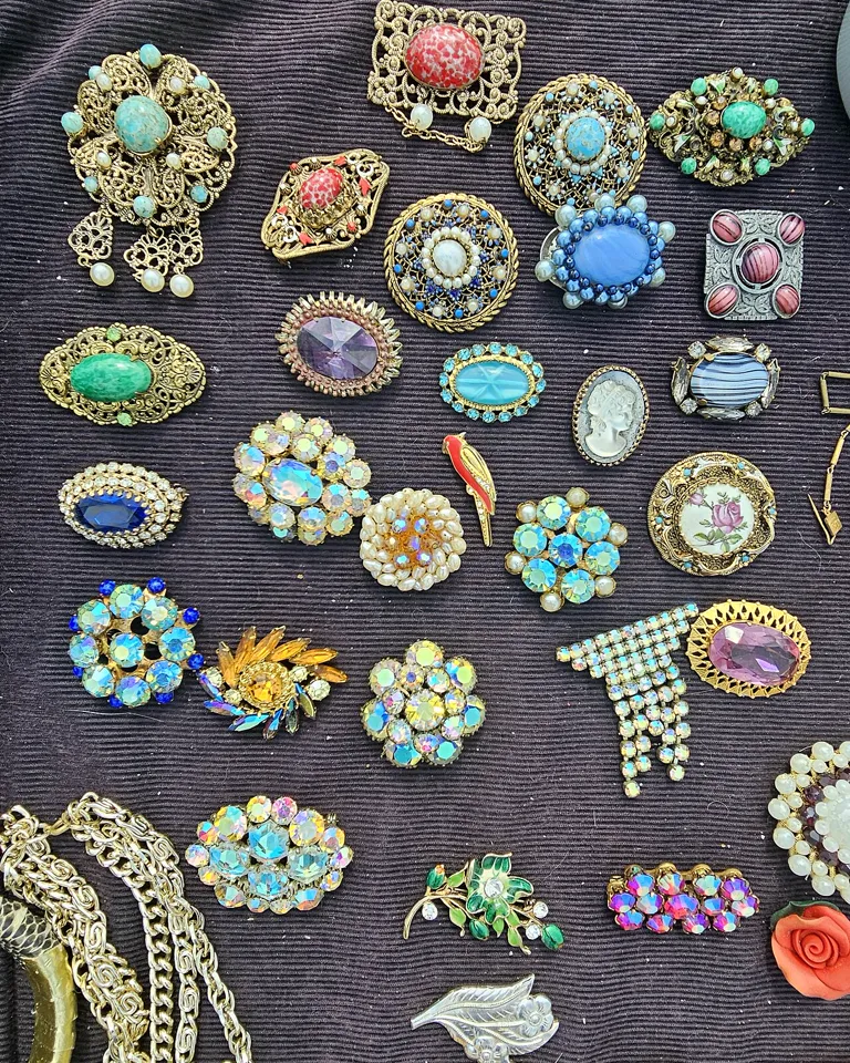 Vintage costume jewelry and brooches at a flea market