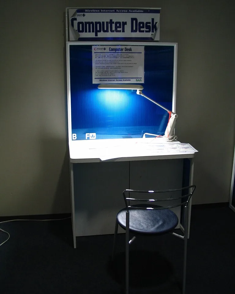 A closet converted into a compact office workspace