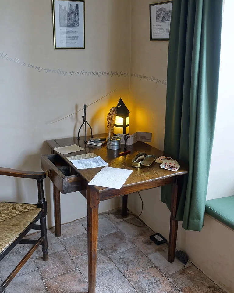 Wooden writing desk in a historic cottage interior