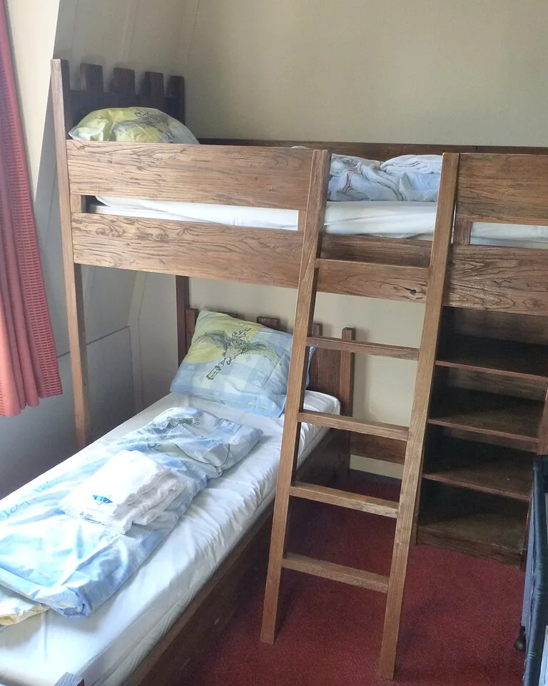 Kids bedroom interior with beds and storage