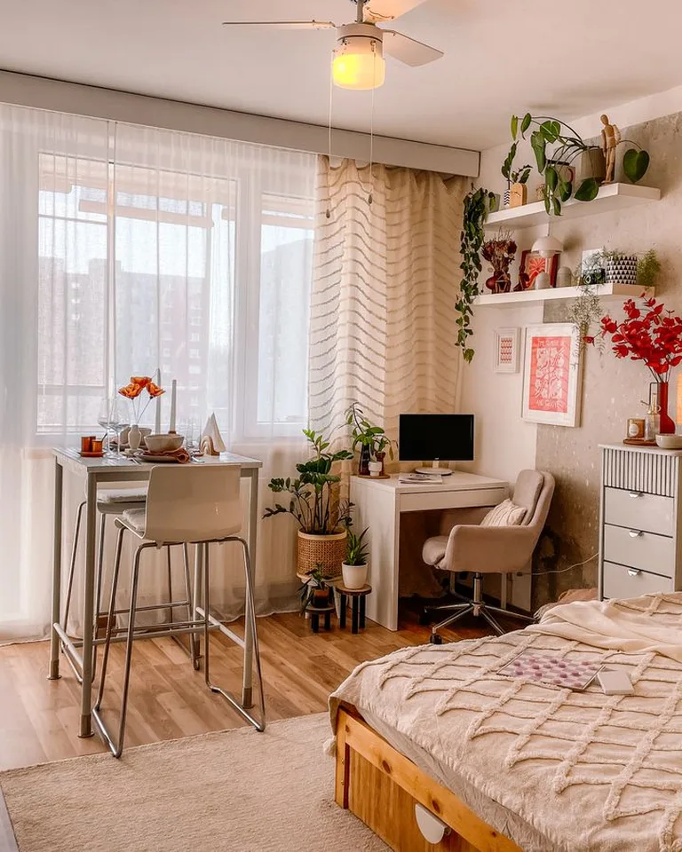 Small bright bedroom with efficient layout making every square foot work