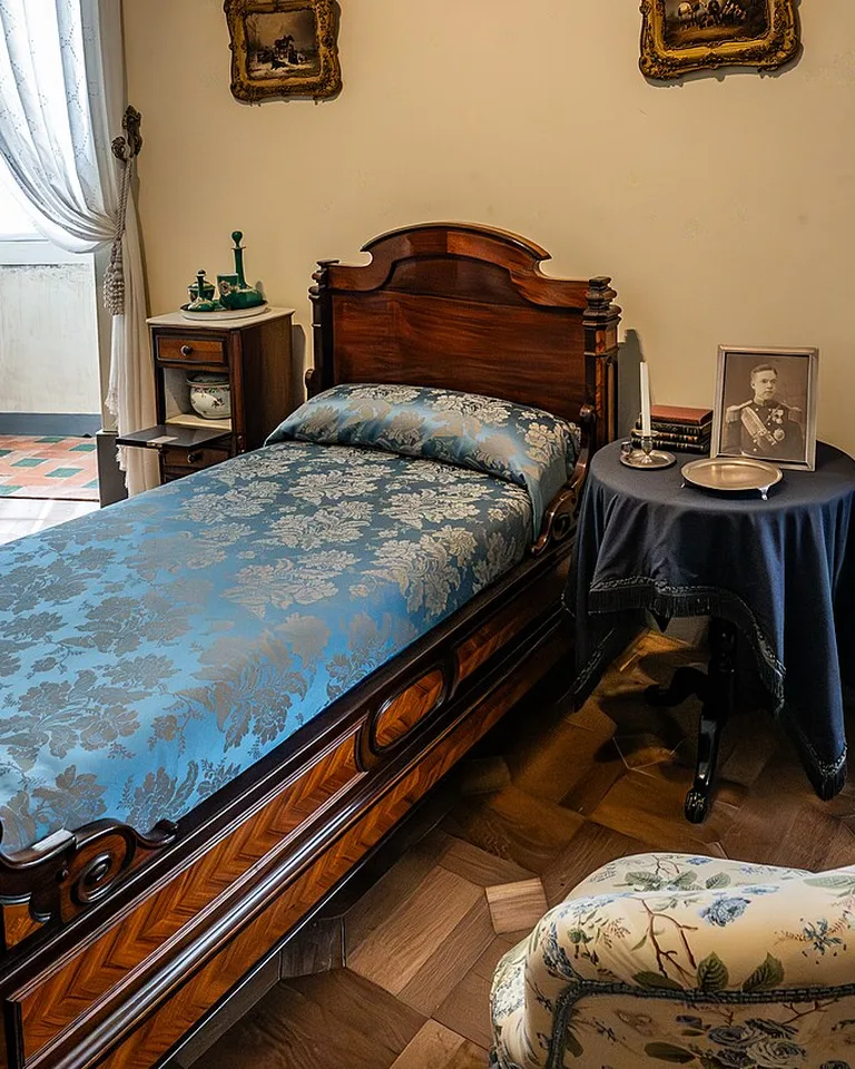 Single bed tucked into the corner of a small bedroom