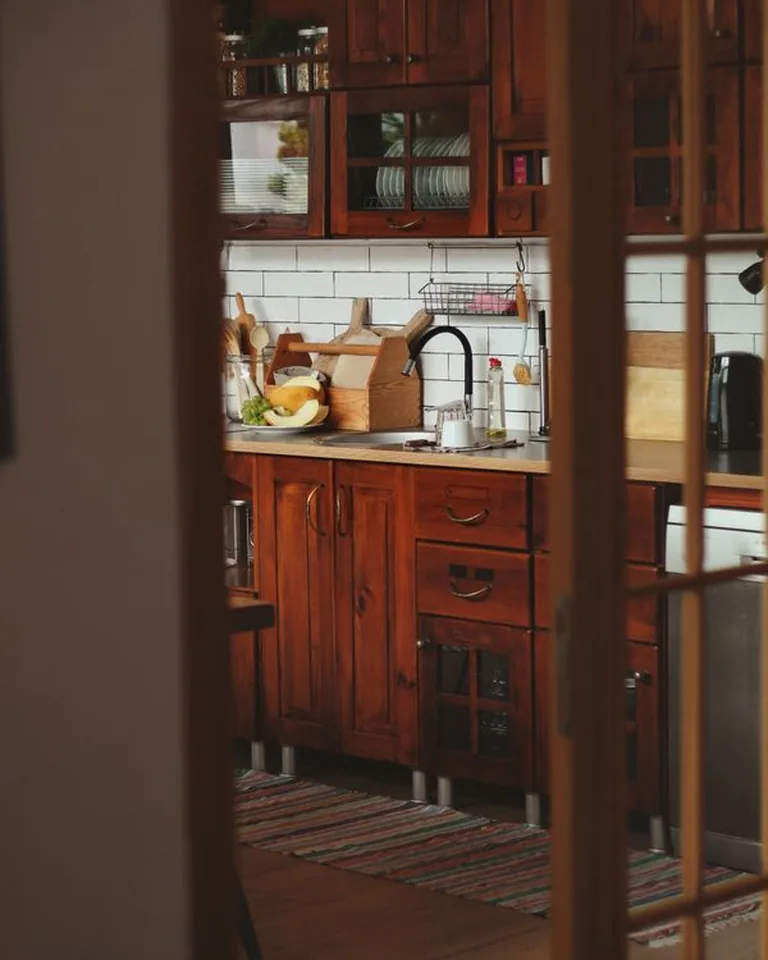 A warm wood kitchen with lived-in details and natural materials