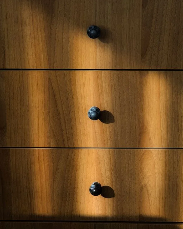Close-up of wooden storage drawers