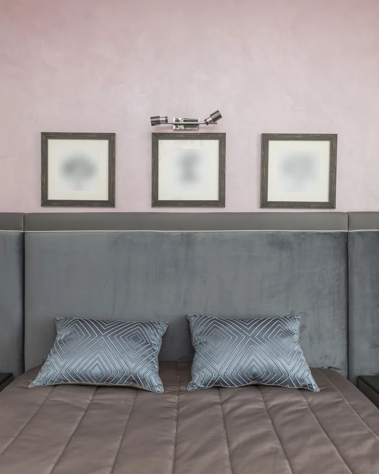 Elegant minimalist bedroom with modern furniture and soft decor
